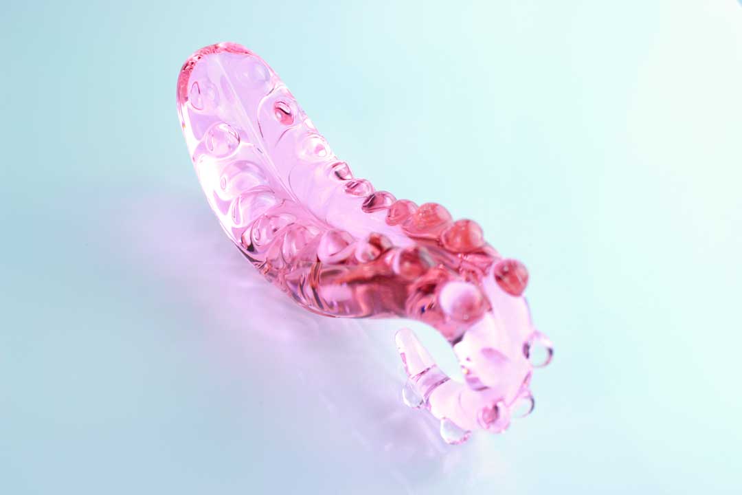 Above view of Girthy Glass Tentacle Dildo on white background