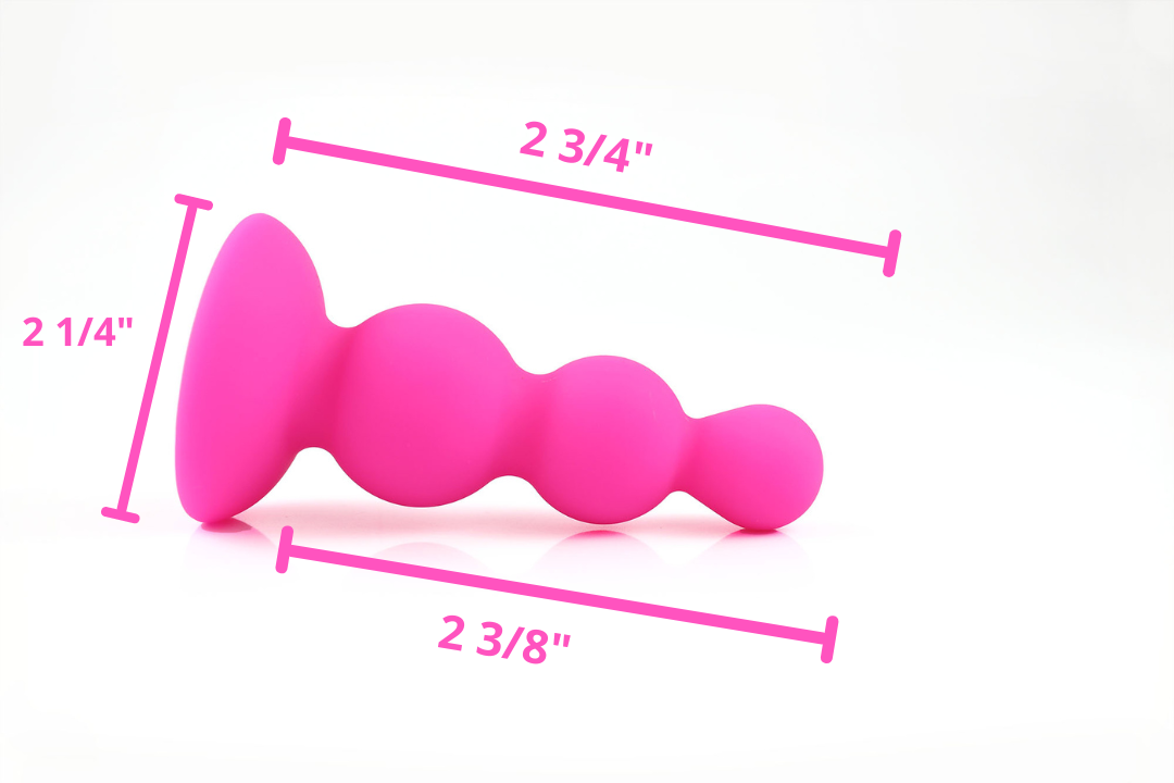 Side view of hot pink beaded gem butt plug and its measurements on a white background