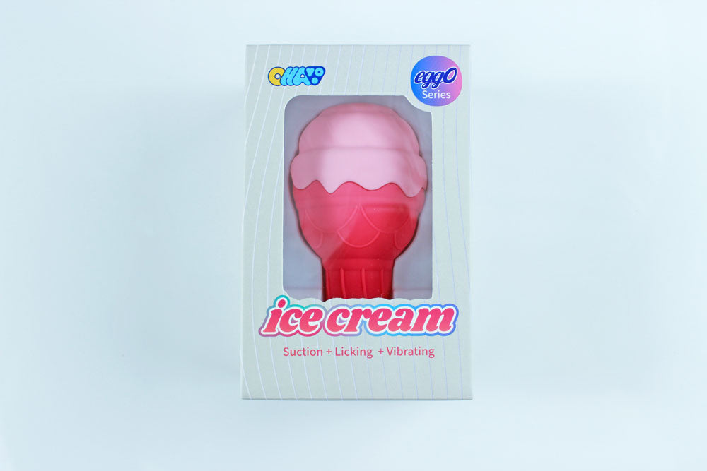 Pink silicone ice cream shaped vibrator in box reading "ice cream / Suction + Licking + Vibrating"on a white background