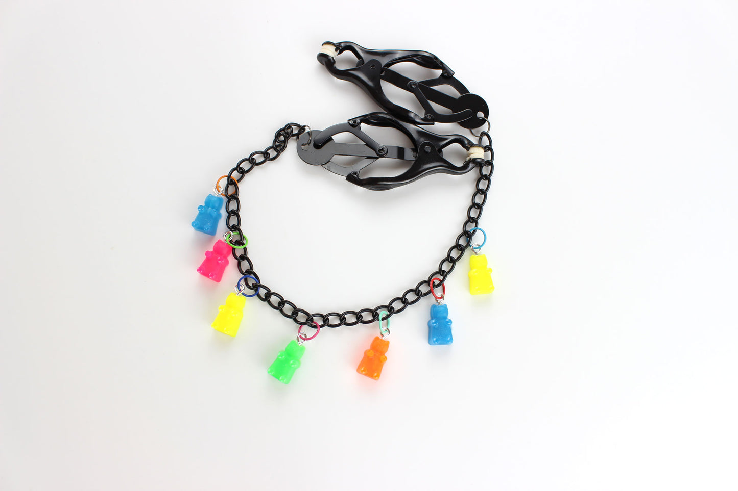 Black clover clamps with neon multicolored gummy bear charms