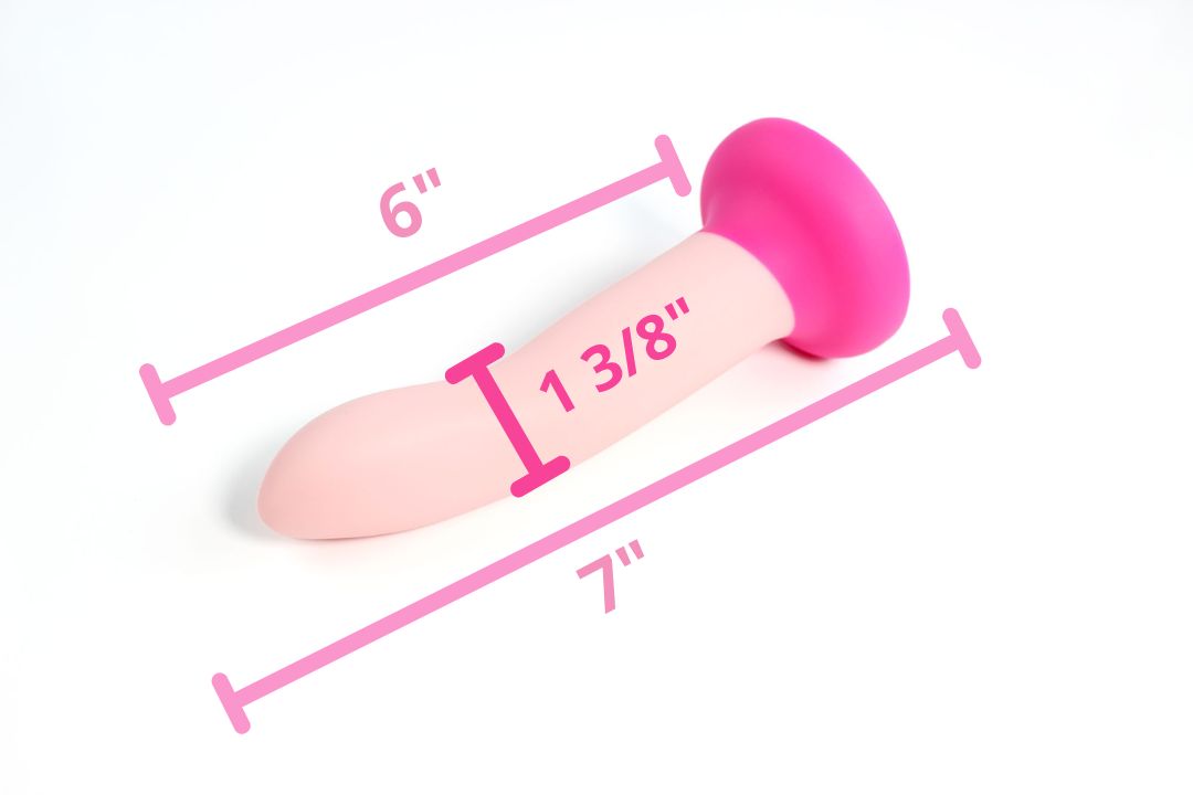 Fuchsia flash dildo on a white background with text showing measurements of 6" insertable length, 7" total length, and 1 3/8" diameter