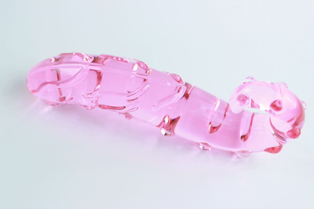 Down shot of upside down 6.125 inch long pink glass tentacle dildo