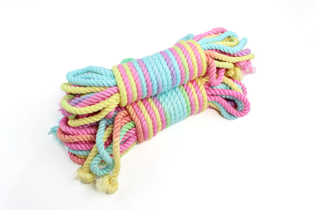 3 bundles of multicolor pastel bamboo silk shibari rope on a white background