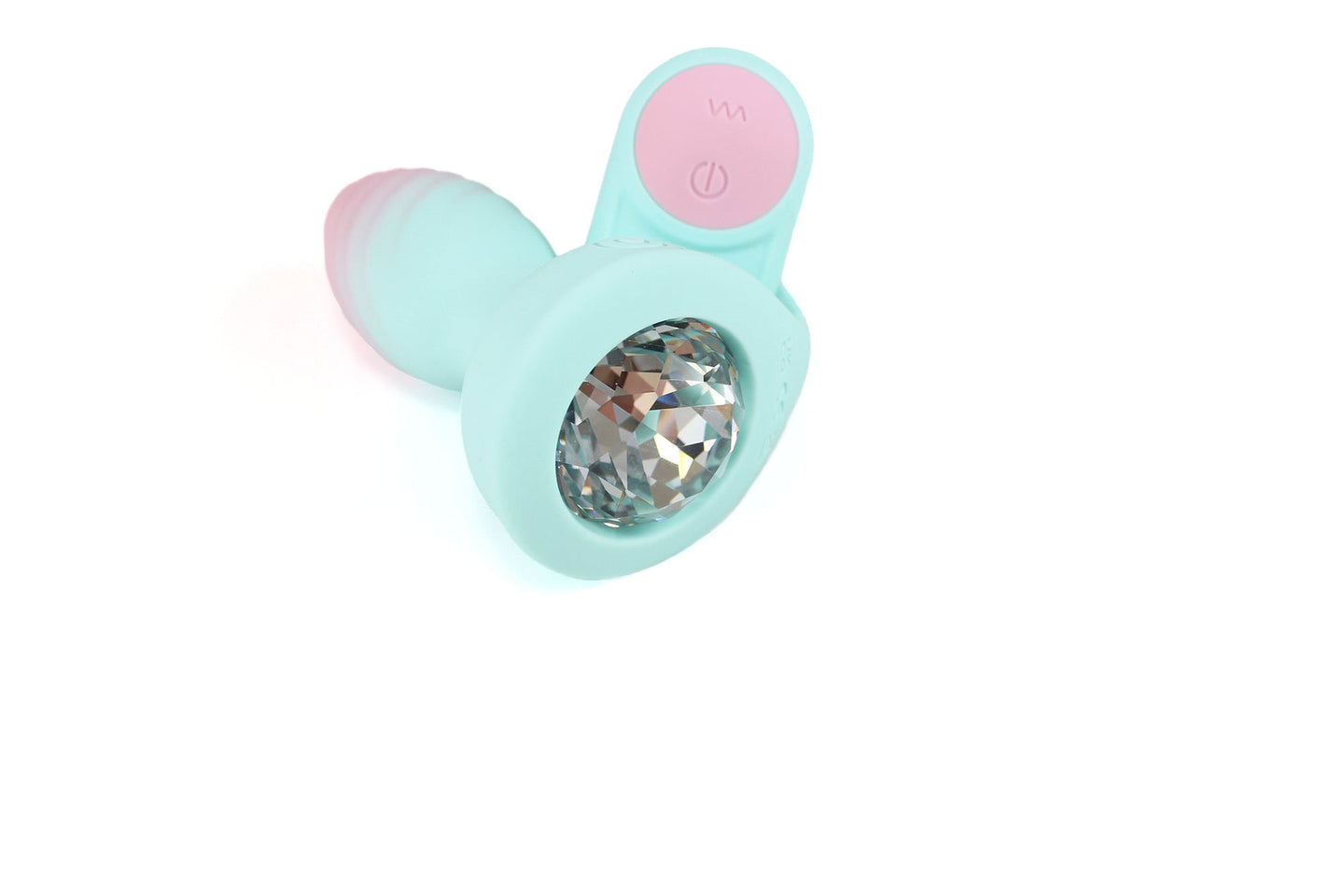 Pastel blue and pink vibrating gem butt plug with remote on white background