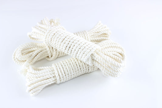 3 bundles of white bamboo silk rope on a white background